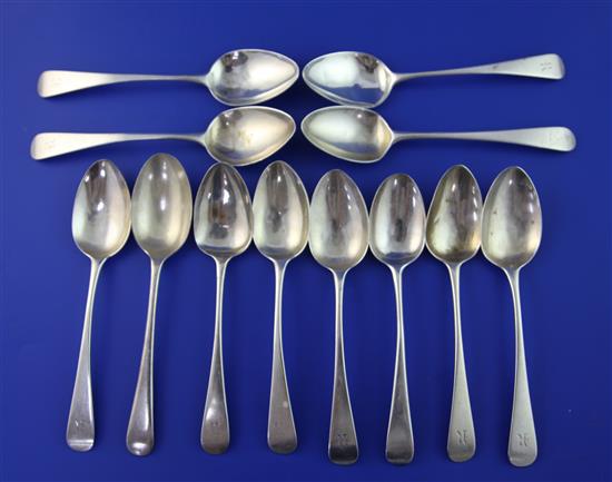 A set of nine George III silver Old English pattern dessert spoons by William Bateman, 11 oz.